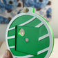 Green Keepsake Ornament without a magnet, showing the magnet spot