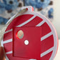 Red Keepsake Ornament without a magnet, showing the magnet spot